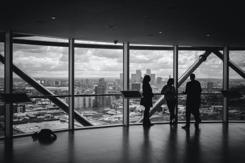 Meeting near a transparent glass